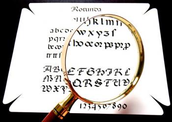 Magnifying glass with unreadable letters
